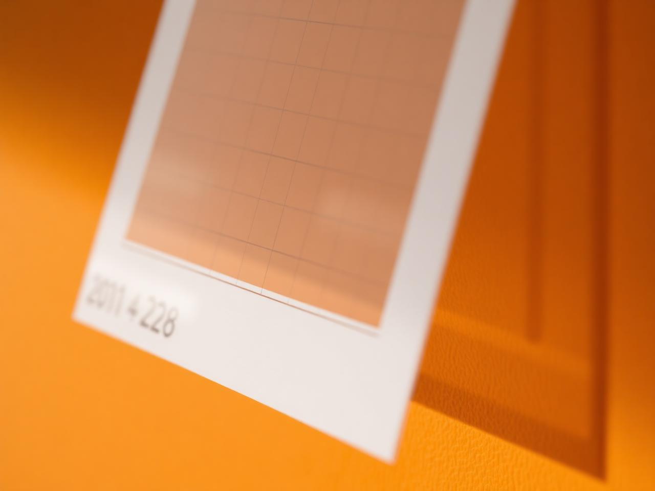 Close-up of the clear laminated calendar surface with the wall colour showing through